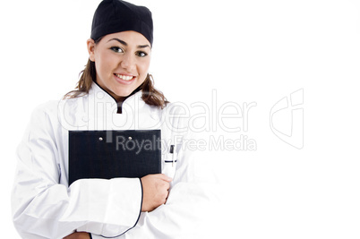 beautiful female chef holding notepad