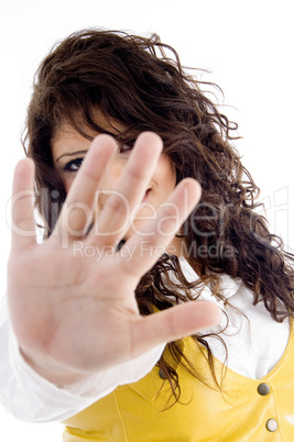 pretty woman stopping someone with open palm