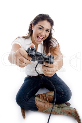 sitting woman showing remote