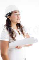 architect with helmet and hardhat and looking upward