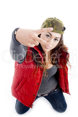 woman showing peace sign