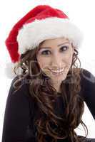 smiling woman wearing christmas hat