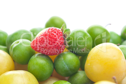 background of  strawberry, green and yellow plum