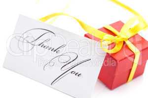red gift box and thank you card  isolated on white