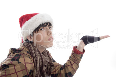 young boy wearing christmas hat showing palm