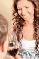 Couple drinking wine and smiling