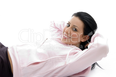 side pose of laying smiling female on white background