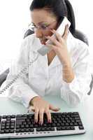 front view of female doctor doing work on white background