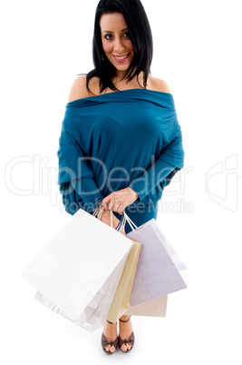 front view of model with shopping bags on white background
