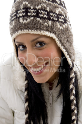 front view of pleased female with woolen cap