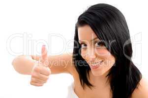 top view of woman showing thumb up on an isolated background