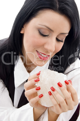 woman holding a rock