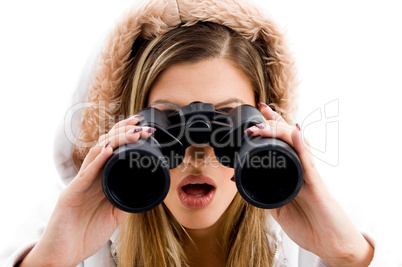 beautiful woman watching with binoculars