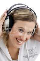 smiling woman tuned in music