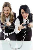 female partners playing game and holding remote