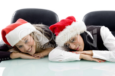 young colleagues wearing christmas hat