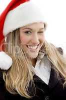 young female winking eyes and wearing christmas hat