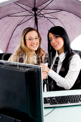 executives holding umbrella