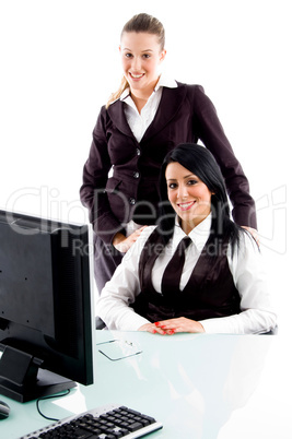 businesspeople smiling and looking at camera