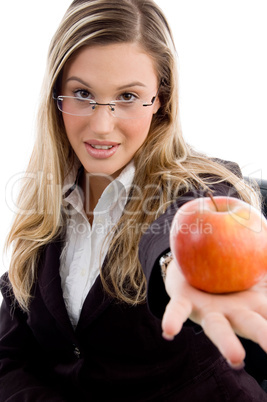young woman showing apple