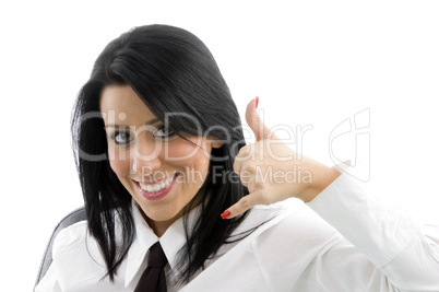 woman showing telephonic hand gesture