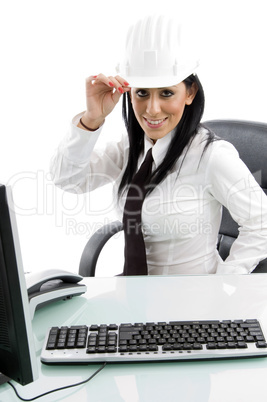 businesswoman wearing architect helmet
