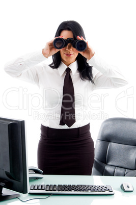 executive looking through binocular