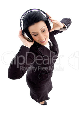 young businesswoman holding headphone