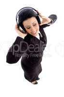 young businesswoman holding headphone
