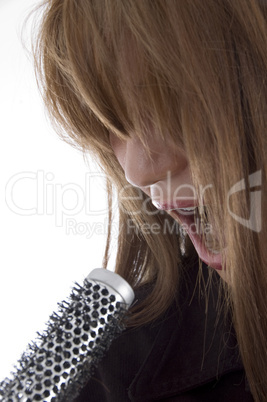 girl singing into karaoke