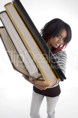 girl showing books