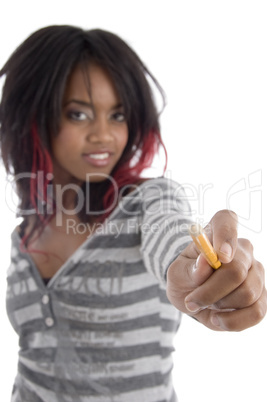 young girl showing pencil