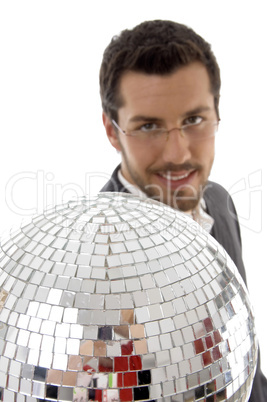 smiling male showing mirror ball