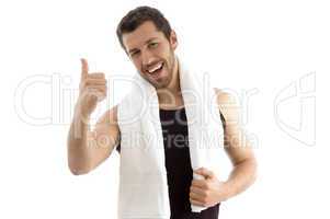 portrait of smiling male with thumbs up