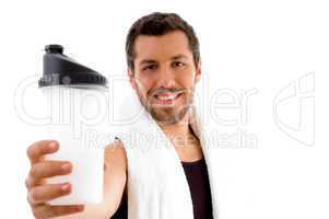 smiling male showing water bottle
