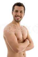 shirtless male with folded hands