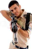 young soldier going to shoot with gun