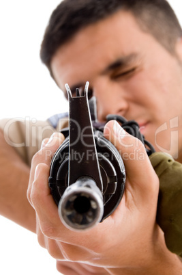 close up of soldier going to shoot with gun