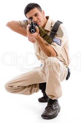 soldier going to shoot with gun