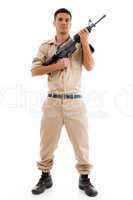 standing soldier posing with gun