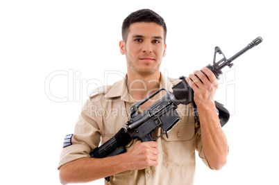 smiling soldier posing with gun