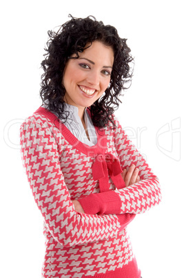 side view of smiling woman with crossed arms
