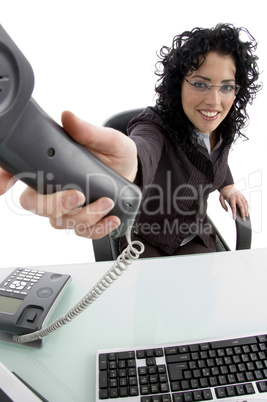 smiling woman showing phone receiver smiling woman showing phone receiver