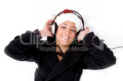 female enjoying music on headphone