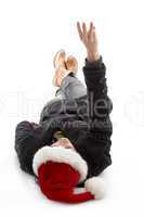 lying female wearing christmas hat and counting fingers