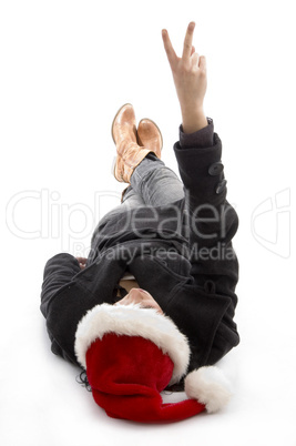 female wearing christmas hat and showing peace sign