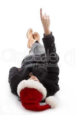 pointing female wearing christmas hat