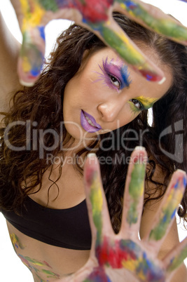 female model showing colorful hands