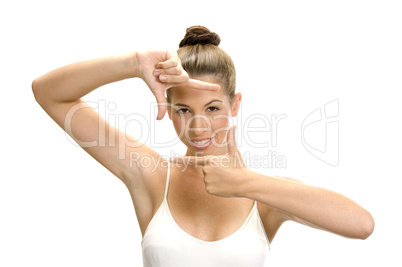 white woman showing framing hand gesture