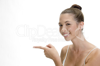 happy young smiling woman pointing